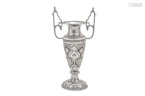 A mid-20th century Iranian (Persian) silver twin handled vas...