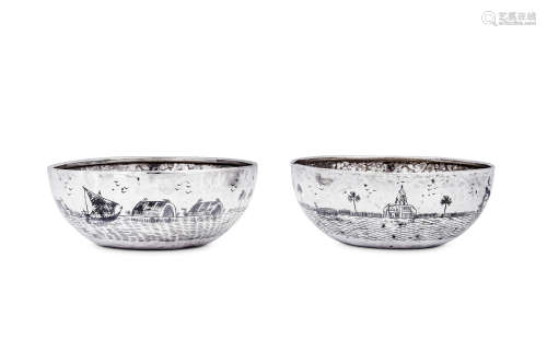 A pair of mid-20th century Iraqi silver and niello bowls, Ba...