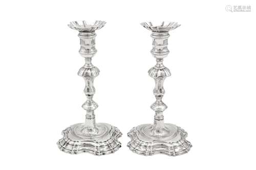 A pair of George II sterling silver candlesticks, London 175...