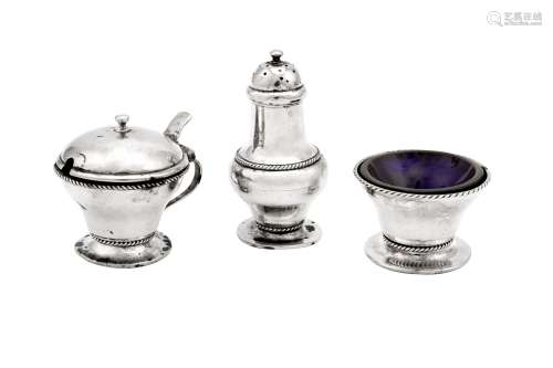 An Edwardian ‘Arts and Crafts’ sterling silver three-piece c...