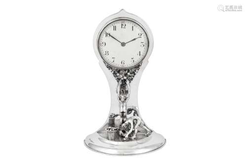 A George V sterling silver figural mantle clock, Birmingham ...