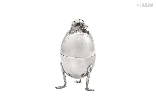 An early 20th century French 950 standard silver novelty egg...