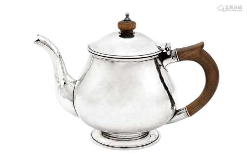 An Elizabeth II sterling silver ‘hand crafted’ teapot, Londo...