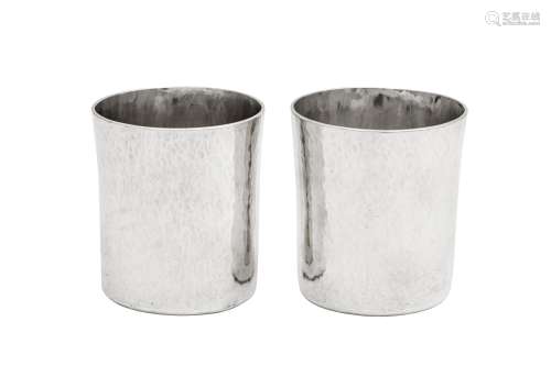 A pair of Elizabeth II hand crafted Britannia standard silve...