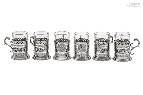 A set of six mid-20th century Iranian (Persian) silver tea g...