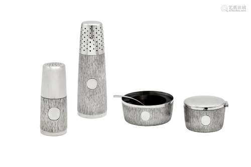 An Elizabeth II modernist sterling silver four-piece cruet s...