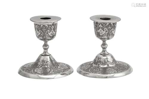 A pair of mid-20th century Iranian (Persian) silver dwarf ca...