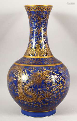 A CHINESE BLUE GROUND BULBOUS VASE, decorated with dragons a...