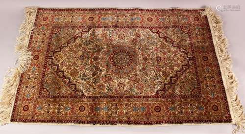 A SMALL TURKISH SILK RUG, 91cm X 62cm.