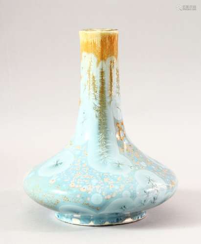 AN UNUSUAL GLAZED CERAMIC VASE, 22cm high.