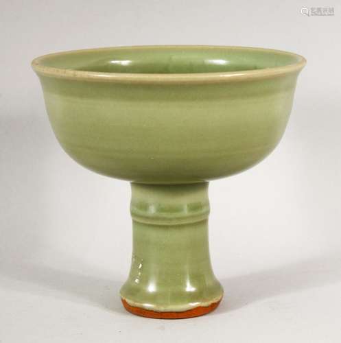 A GOOD CHINESE CELADON STEM CUP, the inside with incised dec...