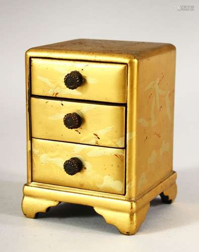 A SMALL JAPANESE GILT LACQUER CHEST, comprising three small ...