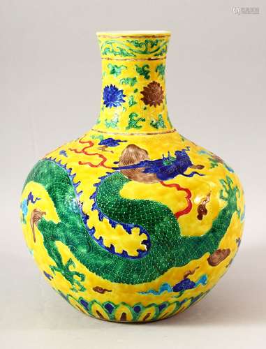 A CHINESE MING STYLE YELLOW GROUND FAHUA VASE, decorated wit...