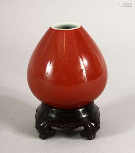 A KANGXI SONG DE BOEUF PEACH VASE and stand, six character m...