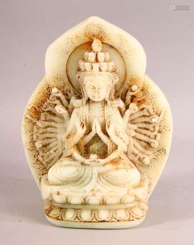 A LARGE CHINESE CARVED JADE FIGURE OF THOUSAND ARM GUANYIN D...