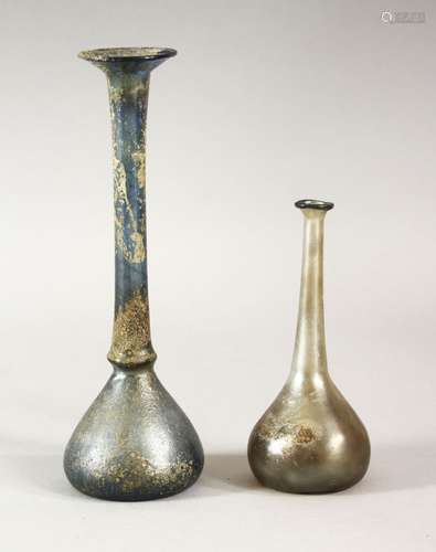 TWO EARLY SLENDER GLASS VESSELS, possibly roman, 10cm and 16...