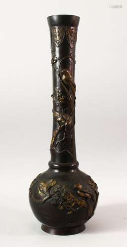 A TALL JAPANESE BRONZE VASE, the neck and body with relief d...