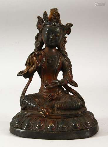 A THAI SEATED BRONZE FEMALE DEITY, 20cm high.