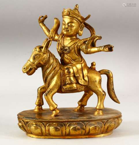 A CHINESE GILT BRONZE FIGURE OF A MAN RIDING AN ASS on a lot...