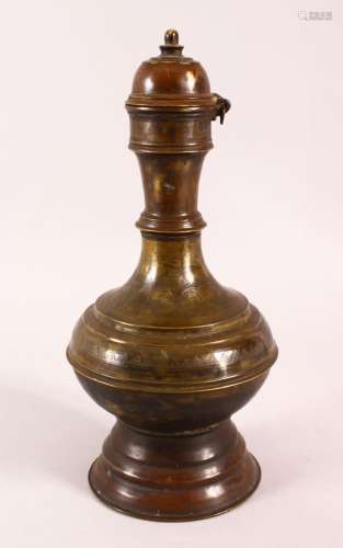A 19TH CENTURY INDIAN BRONZE EWER, with chased floral decora...