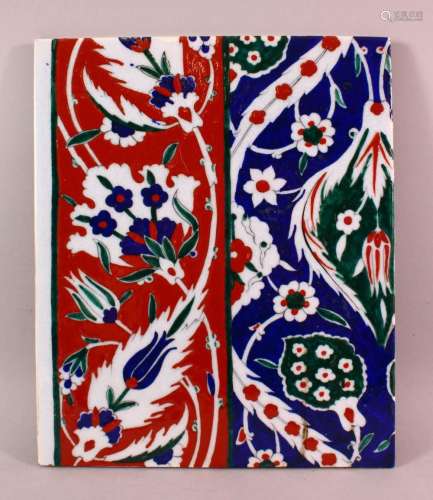 A TURKISH IZNIK STYLE POTTERY TILE SECTION, with floral deco...
