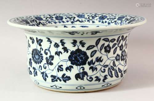 A LARGE CHINESE BLUE AND WHITE WASH POT, profusely decorated...