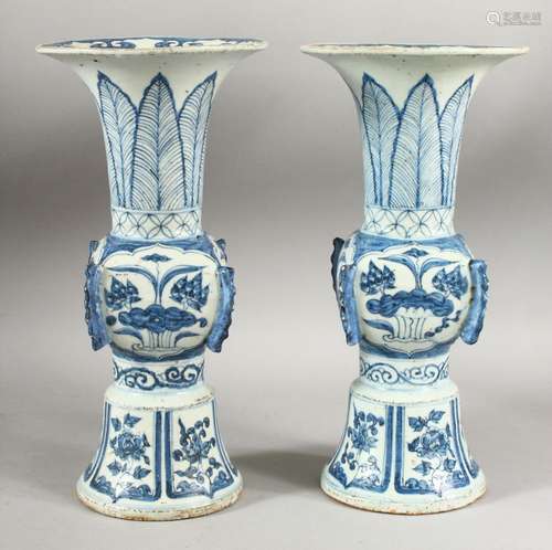 A PAIR OF CHINESE PORCELAIN GU SHAPED VASES, 31cm high.