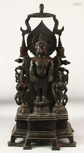 A LARGE AND IMPRESSIVE TIBETAN BRONZE FIGURAL SHRINE, 100cm ...