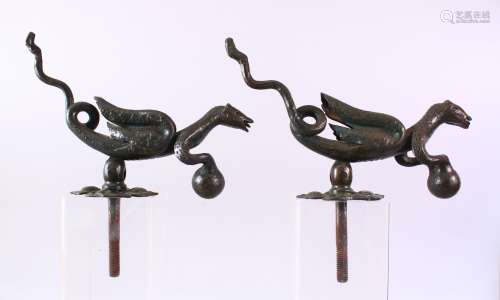 AN UNUSUAL PAIR OF CAST IRON DOOR KNOCKERS, in the form of m...
