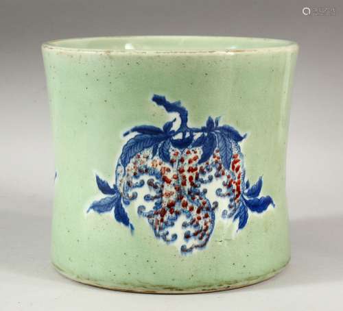 A LARGE CHINESE CELADON GLAZED BRUSH POT, the decorated with...