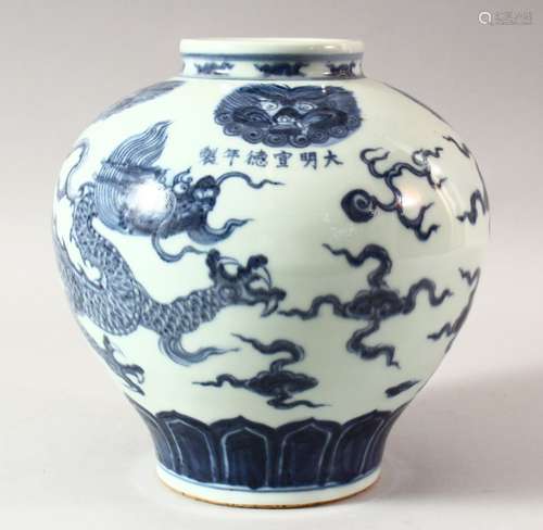 A CHINESE MING STYLE BLUE AND WHITE DRAGON JAR, decorated wi...