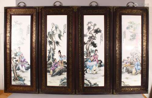 A SET OF FOUR CHINESE FAMILLE ROSE PORCELAIN FRAMED PANELS -...