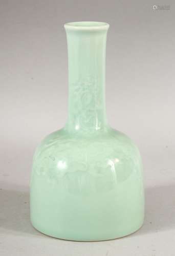 A CHINESE CELADON GLAZED PORCELAIN BOTTLE VASE, the base wit...