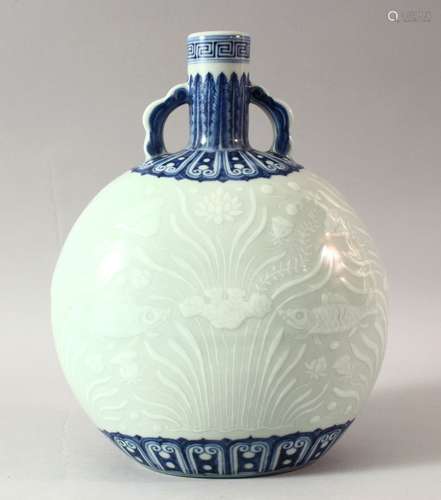 A CHINESE MING STYLE BLUE AND WHITE TWIN HANDLE MOONFLASK, t...