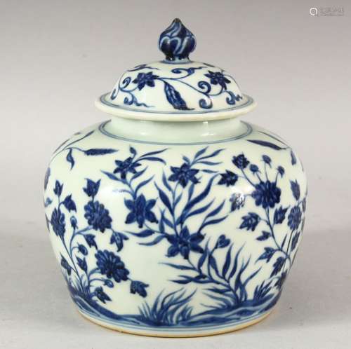 A CHINESE BLUE AND WHITE PORCELAIN JAR AND COVER, the body d...