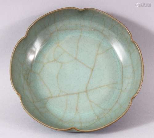 A CHINESE CRACKLE GLAZE CELADON BOWL, the base with circular...