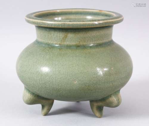 A CHINESE CELADON TRIPLE FOOT CENSER, 9.5cm high.