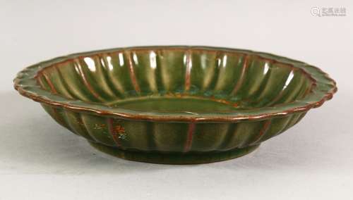 A CHINESE GREEN GLAZED RIBBED BOWL, 19.5cm diameter.