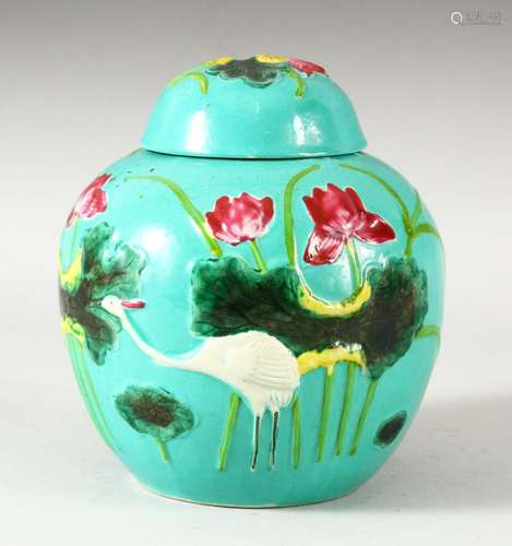 A CHINESE TURQUOISE GLAZED MOULDED VASE AND COVER, the body ...