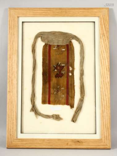 AN EARLY PERUVIAN CHANCAY TEXTILE FRAGMENT, framed and glaze...