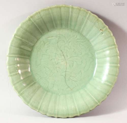 A CHINESE CELADON LOBED DISH, possibly 18th century, the cen...