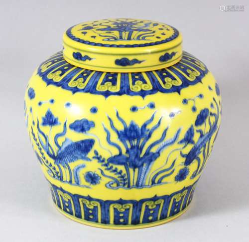 A CHINESE YELLOW GROUND PORCELAIN JAR AND COVER, the painted...