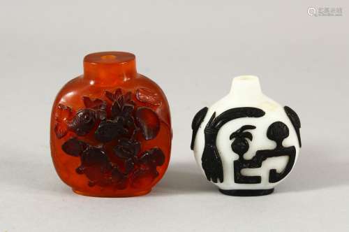 TWO CHINESE SNUFF BOTTLES - one with a white ground with bla...