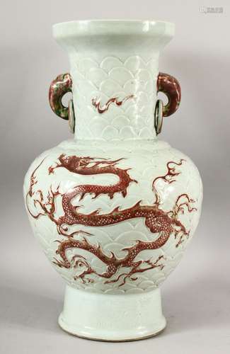 A CHINESE MNIG STYLE CELADON GLAZED CARVED PORCELAIN VASE - ...