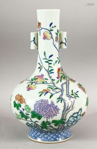 A CHINESE DOUCAI DECORATED PORCELAIN POMEGRANATE - decorated...