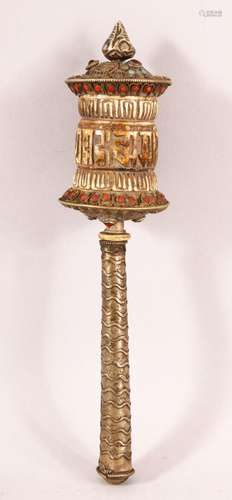 A 19TH CENTURY TIBETAN CARVED BONE AND WHITE METAL PRAYER WH...