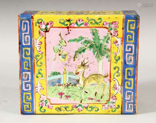 A CHINESE FAMILLE ROSE / JAUNE PORCELAIN PILLOW, with pierce...