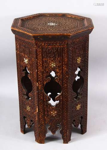 A MOORISH OCTAGONAL OCCASIONAL TABLE with carved decoration,...