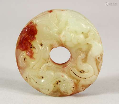 A CHINESE CARVED JADE BI / PENDANT - the pendant carved in t...