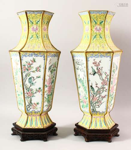 A LARGE PAIR OF CHINESE ENAMEL VASES & STANDS, the vases dec...